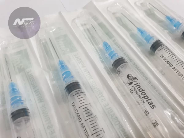 DISPOSABLE SYRINGE